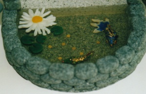 Water feature with lilies and fish