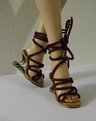 Sandals with cardboard soles and string