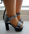 Black and metal platforms for Miss Piggy